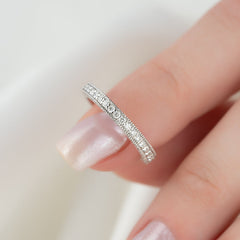 Elegant Halo VVS1 Lab-Grown Wedding Ring in 18K White Gold Closeup Finger View