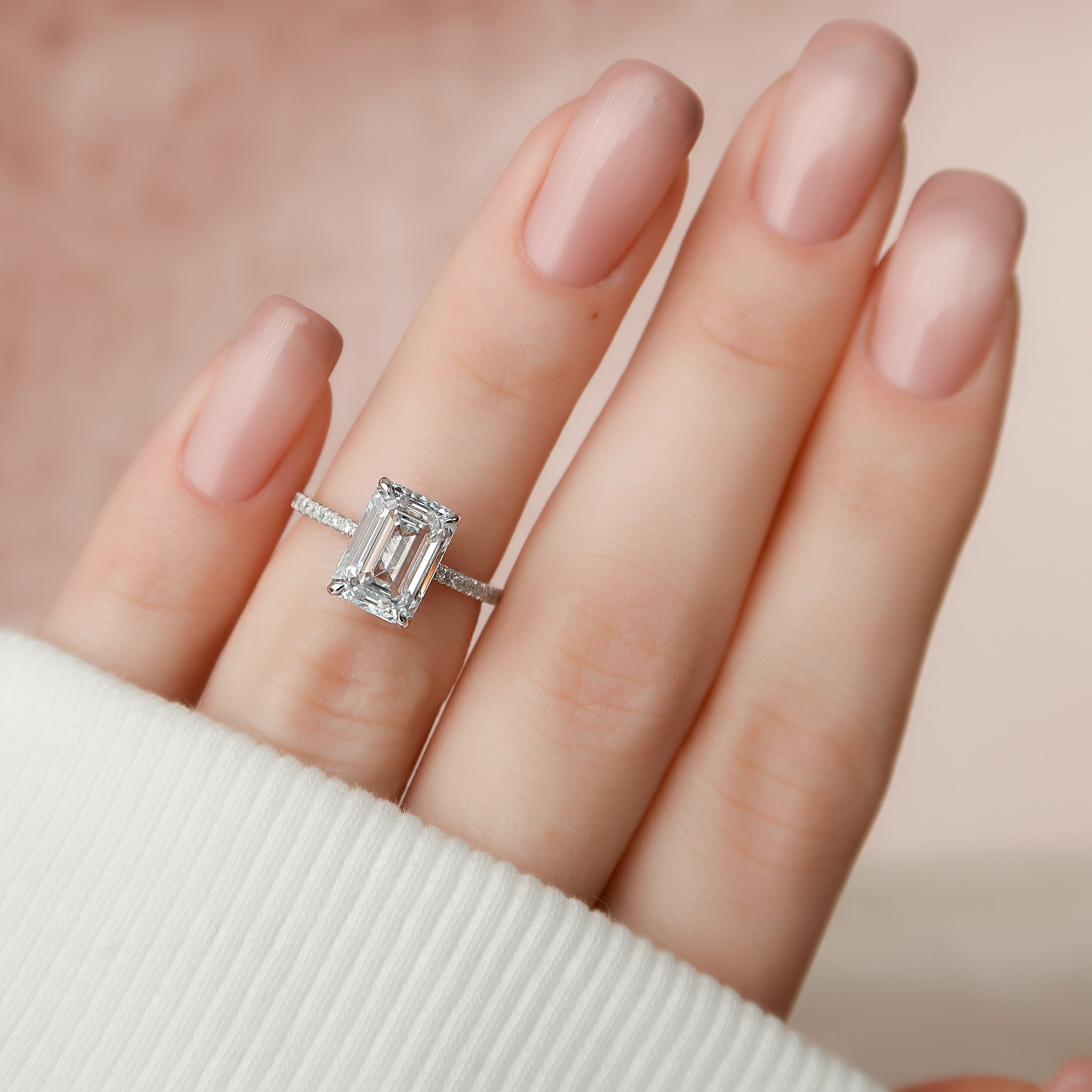 Arcade Grace 1 Carat VVS Lab-Grown Emerald Hidden Halo Pave Engagement Ring in 18K White Gold Finger View