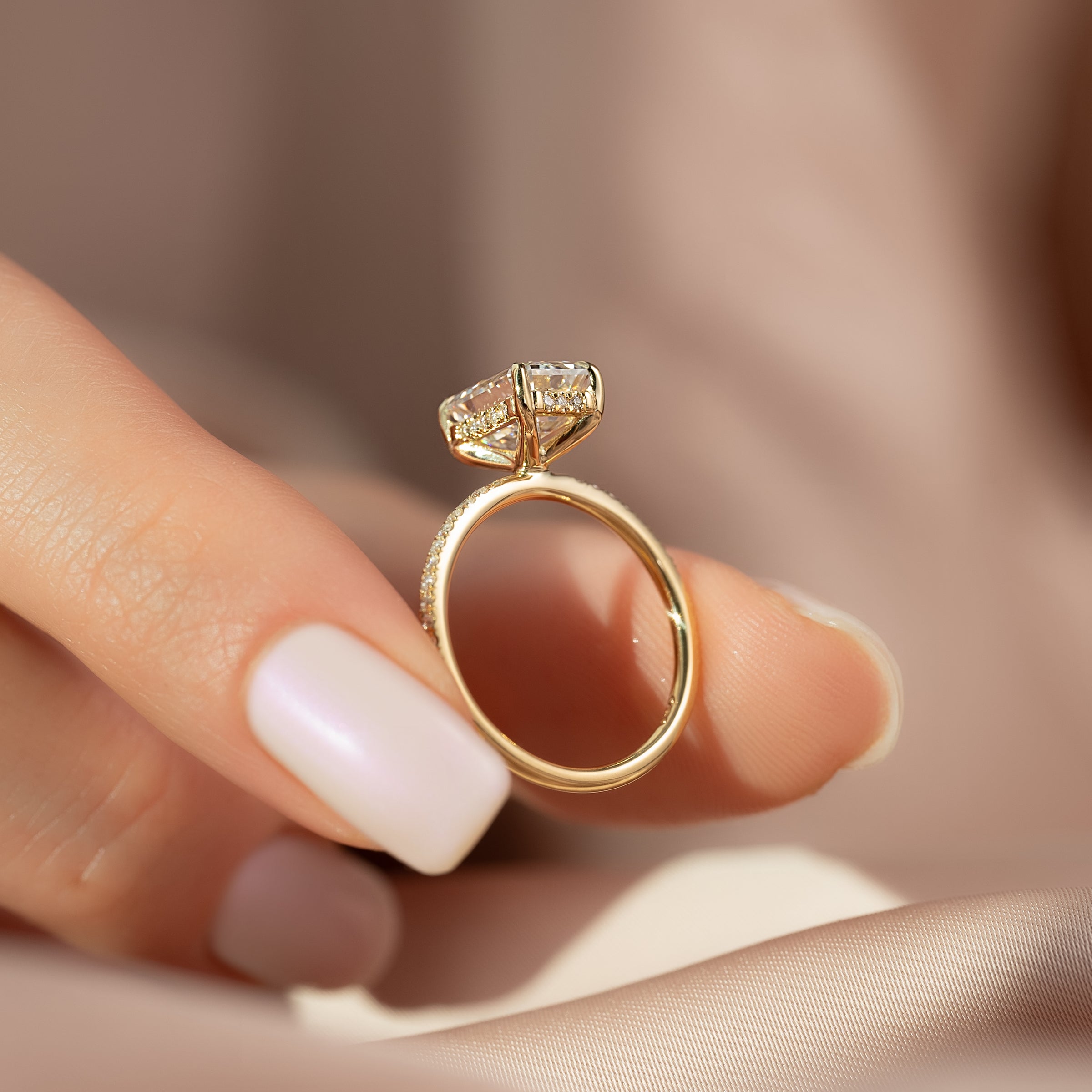 Arcade Grace 1 Carat VVS Lab-Grown Emerald Hidden Halo Pave Engagement Ring in 18K Yellow Gold Hand View