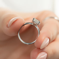 Auric Dawn Emerald 2.19 Carat VVS1 Lab-Grown Hidden Halo Engagement Ring in 18K White Gold Hand View