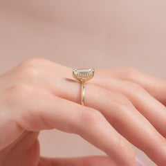 Auric Dawn Emerald 2.19 Carat VVS1 Lab-Grown Hidden Halo Engagement Ring in 18K Yellow Gold Finger Closeup View