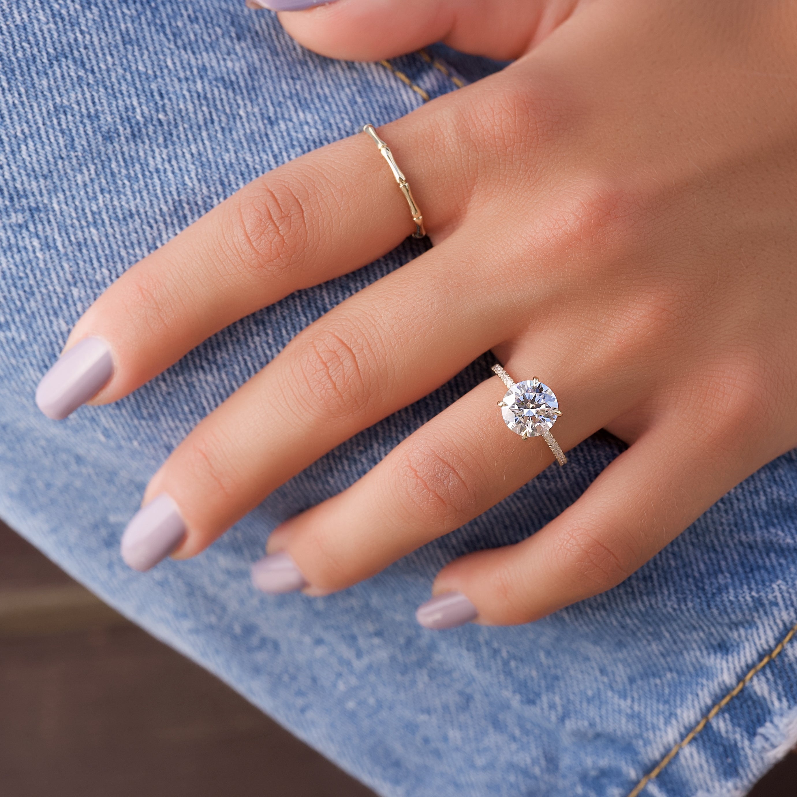 Aurora Circle 1 Carat VVS1 Lab-Grown Hidden Halo Pave Engagement Ring in 18K Yellow Gold Hand View