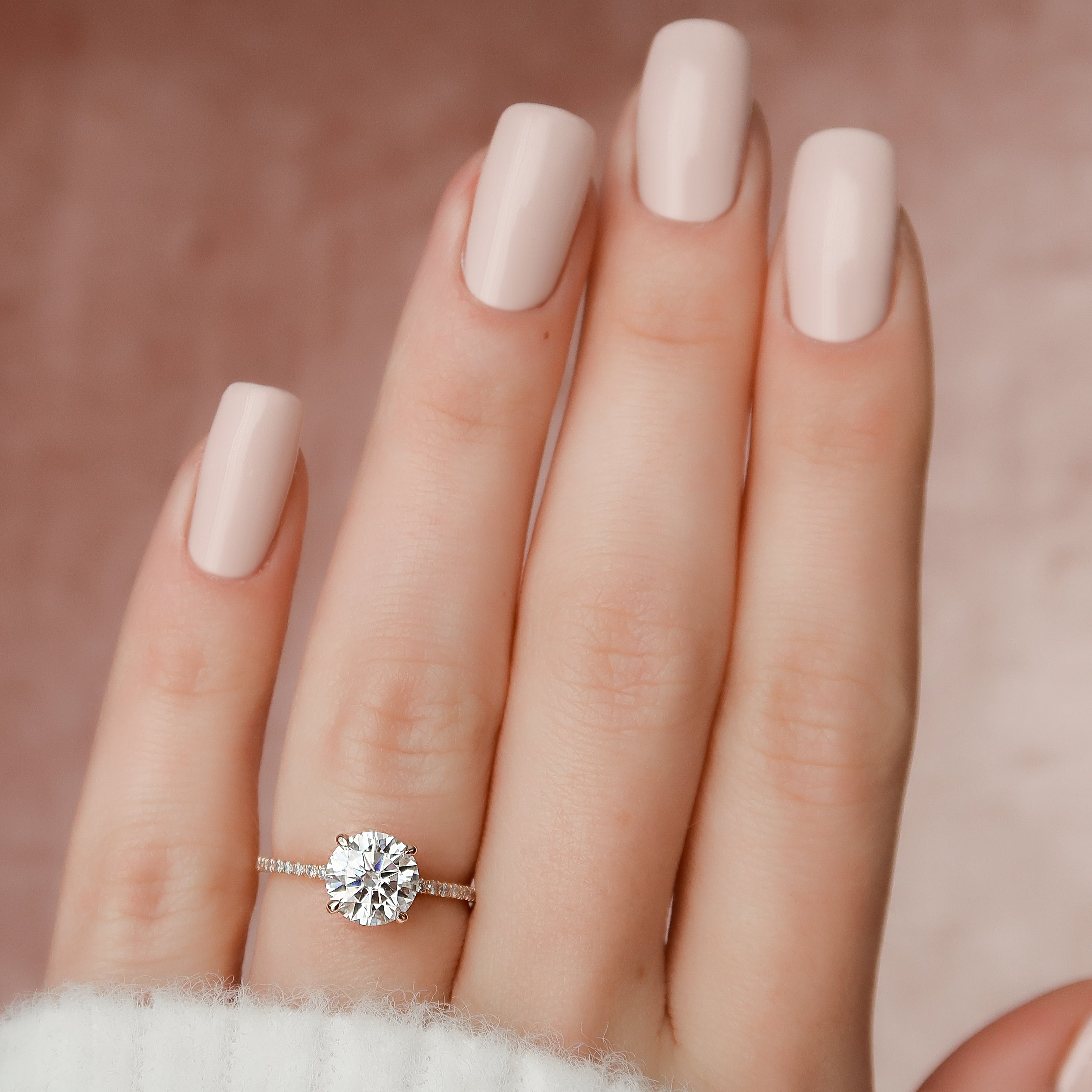 Aurora Circle 1 Carat VVS1 Lab-Grown Hidden Halo Pave Engagement Ring in 18K Rose Gold Finger View