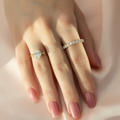 Aurora Halo 1.50 Carat VVS1 Lab‑Grown Oval Halo Engagement Ring in 18K Yellow Gold Finger View