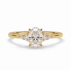 Celestial Harmony 1 Carat Oval VVS1 M oissanite Three Stone Engagement Ring in 18K Yellow Gold 