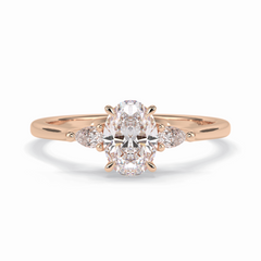 Celestial Harmony 1 Carat Oval VVS1 Moissanite Three Stone Engagement Ring in 18K Rose Gold