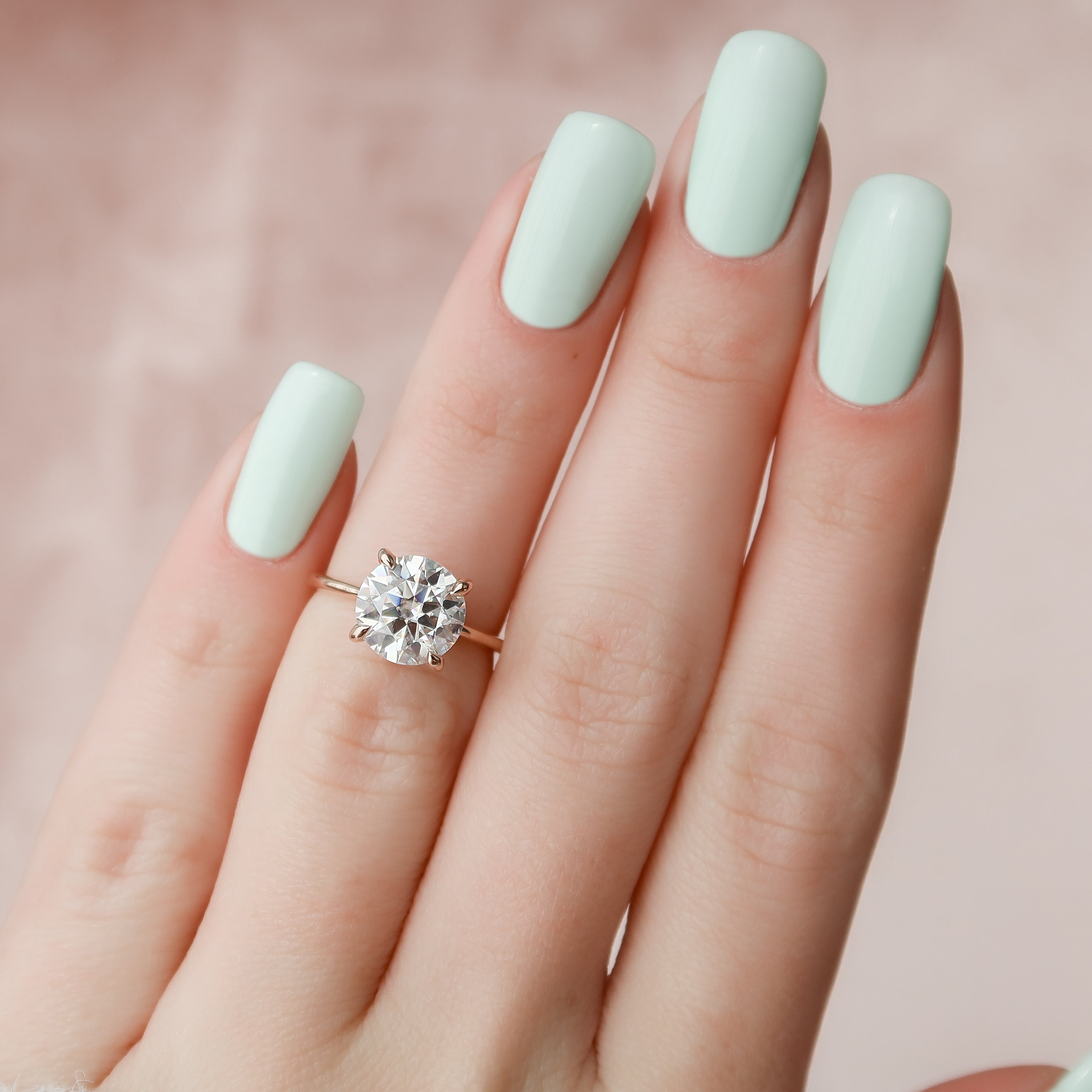 Celestial Whisper 2 Carat VVS1 Lab-Grown Hidden Halo Engagement Ring 18K Rose Gold Finger Closeup View