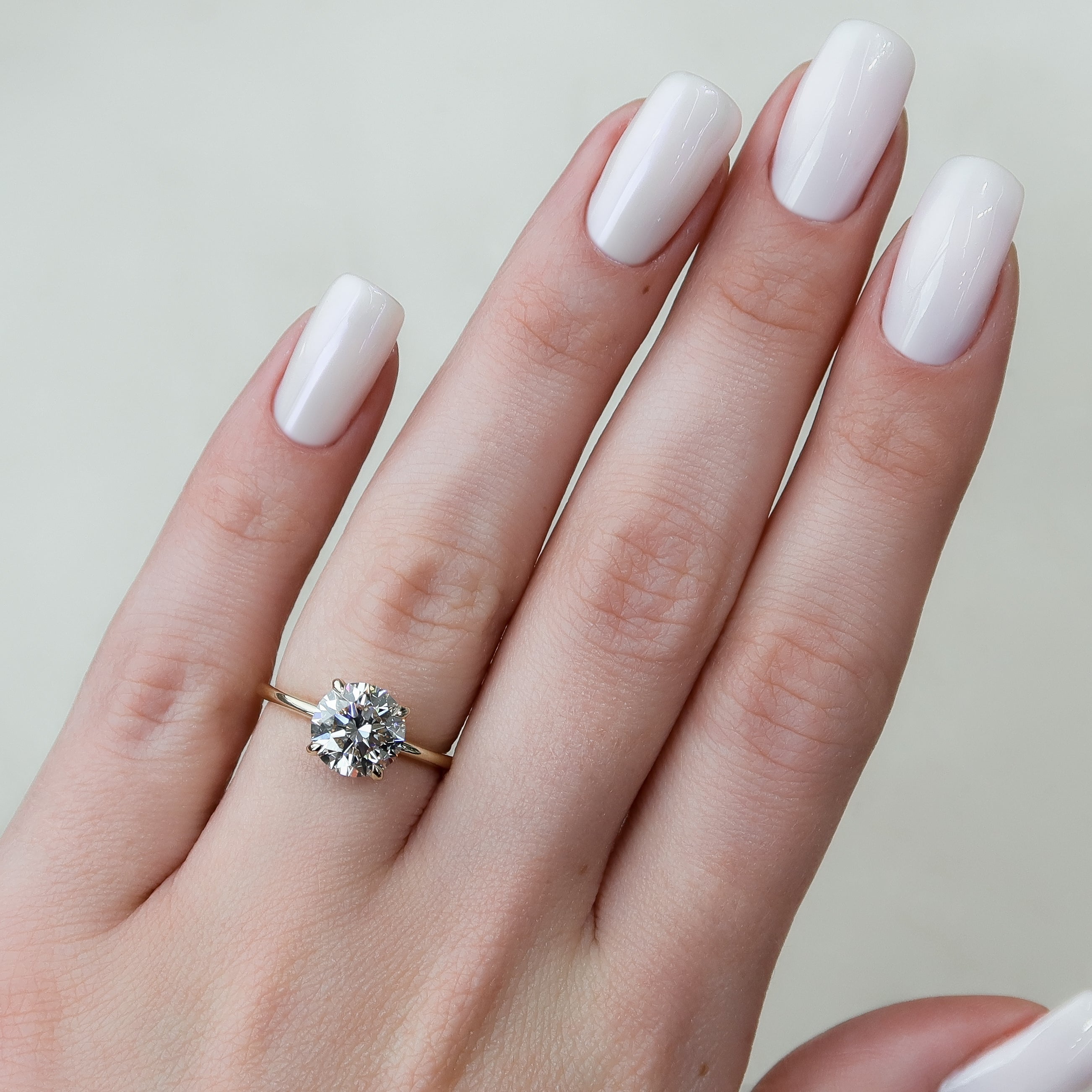 Celestial Whisper 2 Carat VVS1 Lab-Grown Hidden Halo Engagement Ring 18K Yellow Gold Finger View