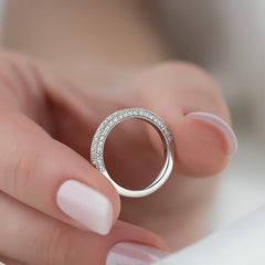 Elegant Halo VVS1 Lab-Grown Wedding Ring in 18K White Gold Closeup On Finger Side View