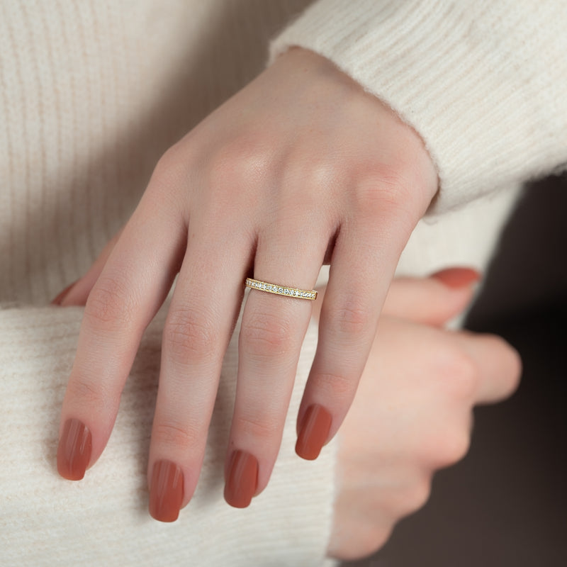 Elegant Halo VVS1 Lab-Grown Wedding Ring in 18K Yellow Gold Closeup Finger Front View 