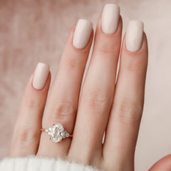 Elowen Grace 2.70 Carat VVS Lab-Grown Oval Engagement Ring in 18K Rose Gold Finger Side View