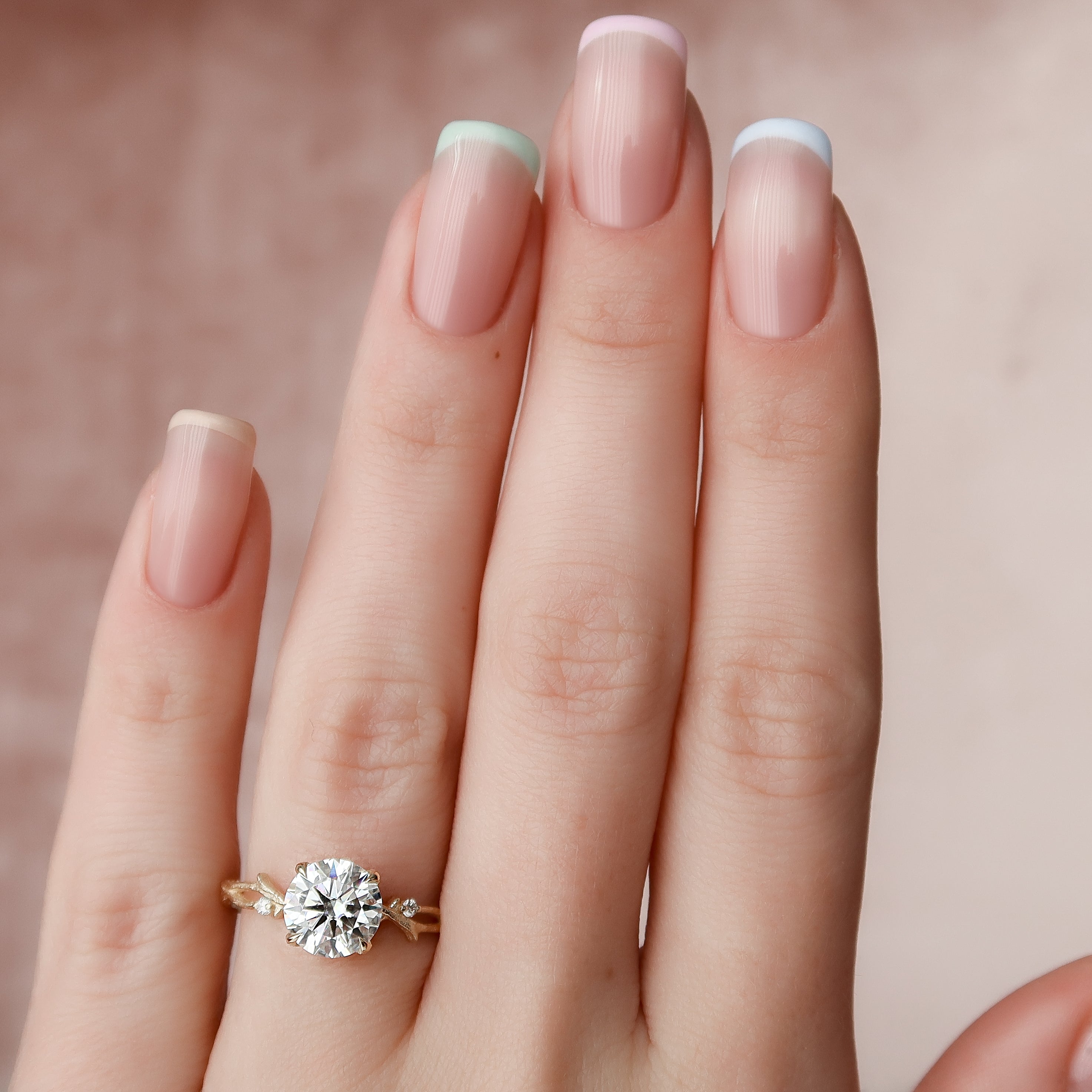 Elysian Glow 1.50 Carat VVS1 Lab-Grown Textured Three Stone Ring in 18K Yellow Gold Hand Closeup View