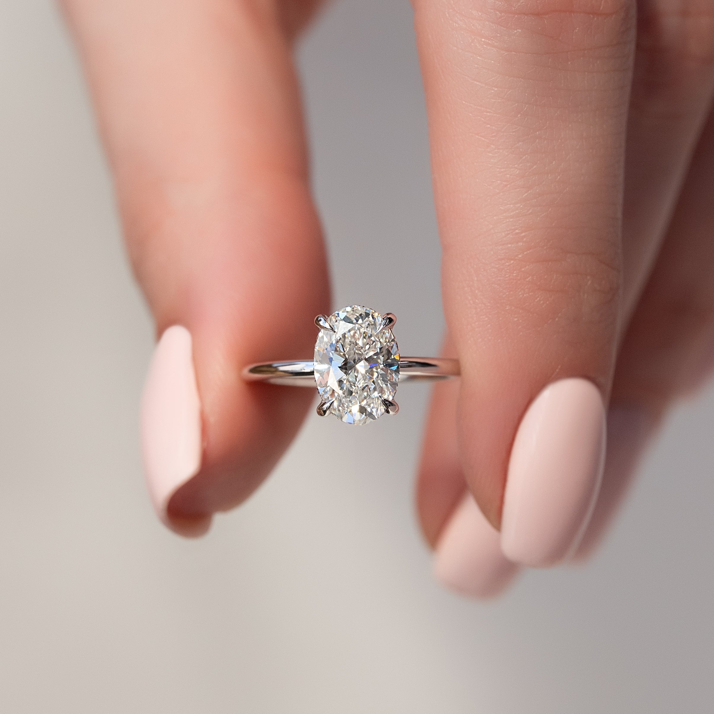 Elysian Oval 1.58 Carat VVS1 Lab-Grown Hidden Halo Engagement Ring in 18K White Gold Closeup View