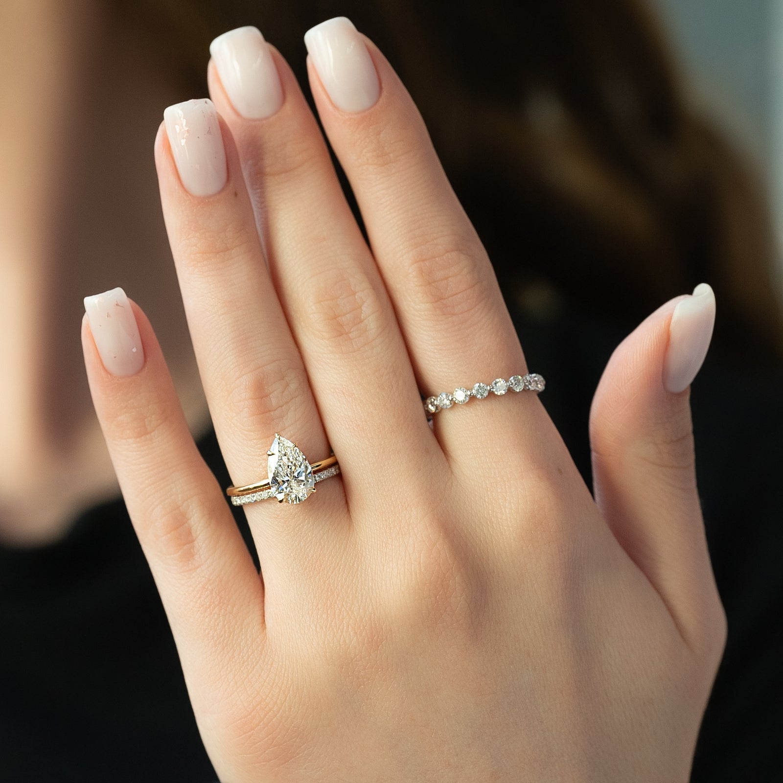 Enchantia Pear 1.70 Carat VVS1 Lab-Grown Hidden Halo Engagement Ring in 18K Yellow Gold Finger View