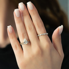 Enchantia Pear 1.70 Carat VVS1 Lab-Grown Hidden Halo Engagement Ring in 18K Yellow Gold Finger View