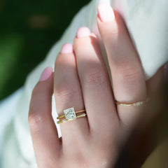 Gentle Wave VVS1 Lab‑Grown Half Eternity Wedding Ring in 18K Yellow Gold Finger View