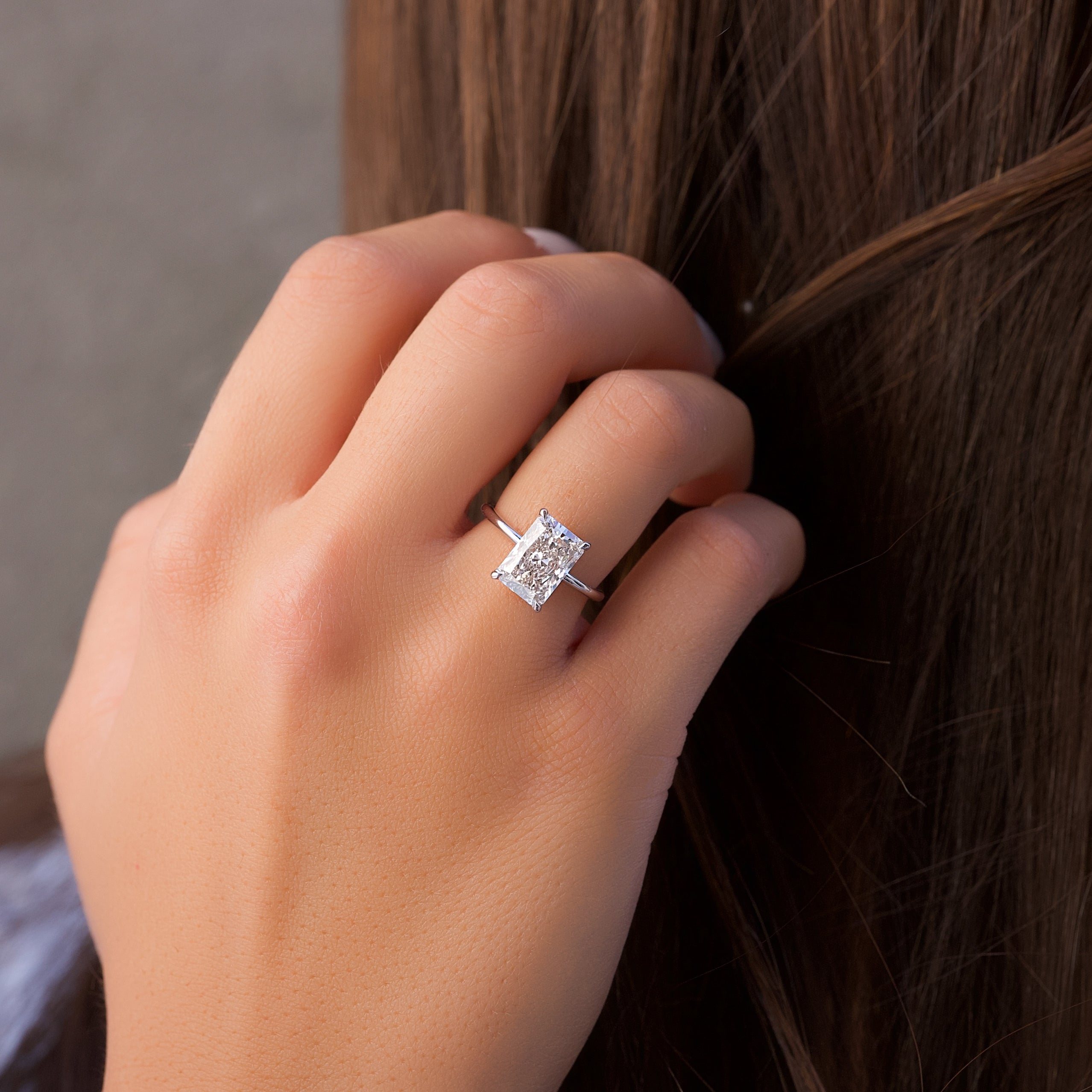 Ivy Crest 1.41 Carat VVS Lab-Grown Radiant Hidden Halo Engagement Ring in 18K White Gold Finger View