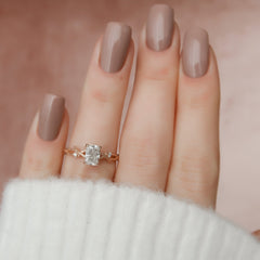 Luminescent 2.78 Carat VVS1 Lab-Grown Radiant Three-Stone Engagement Ring in 18K Rose Gold Hand View