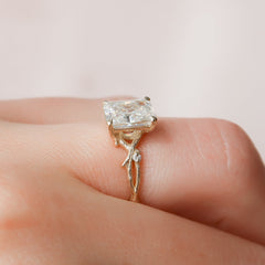 Luminescent 2.78 Carat VVS1 Lab-Grown Radiant Three-Stone Engagement Ring in 18K Yellow Gold Hand View
