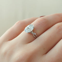 Lustrella 2.50 Carat Oval VVS1 Lab-Grown Three Stone Engagement Ring 18K White Gold Hand Closeup View