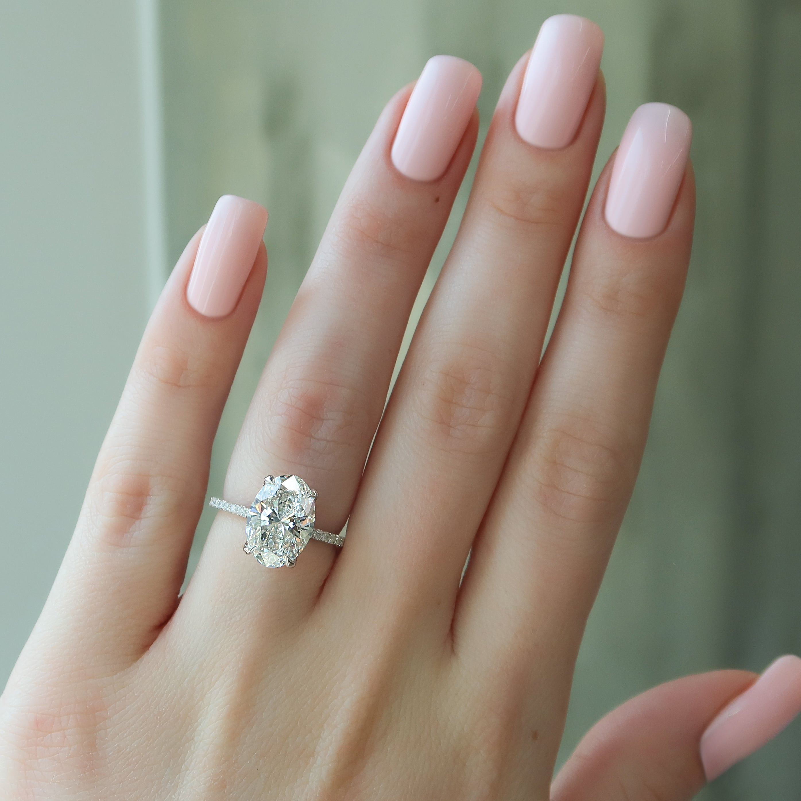 Lustrous Radiance 2 Carat VVS1 Lab-Grown Hidden Halo Pave Engagement Ring in 18K White Gold Finger View