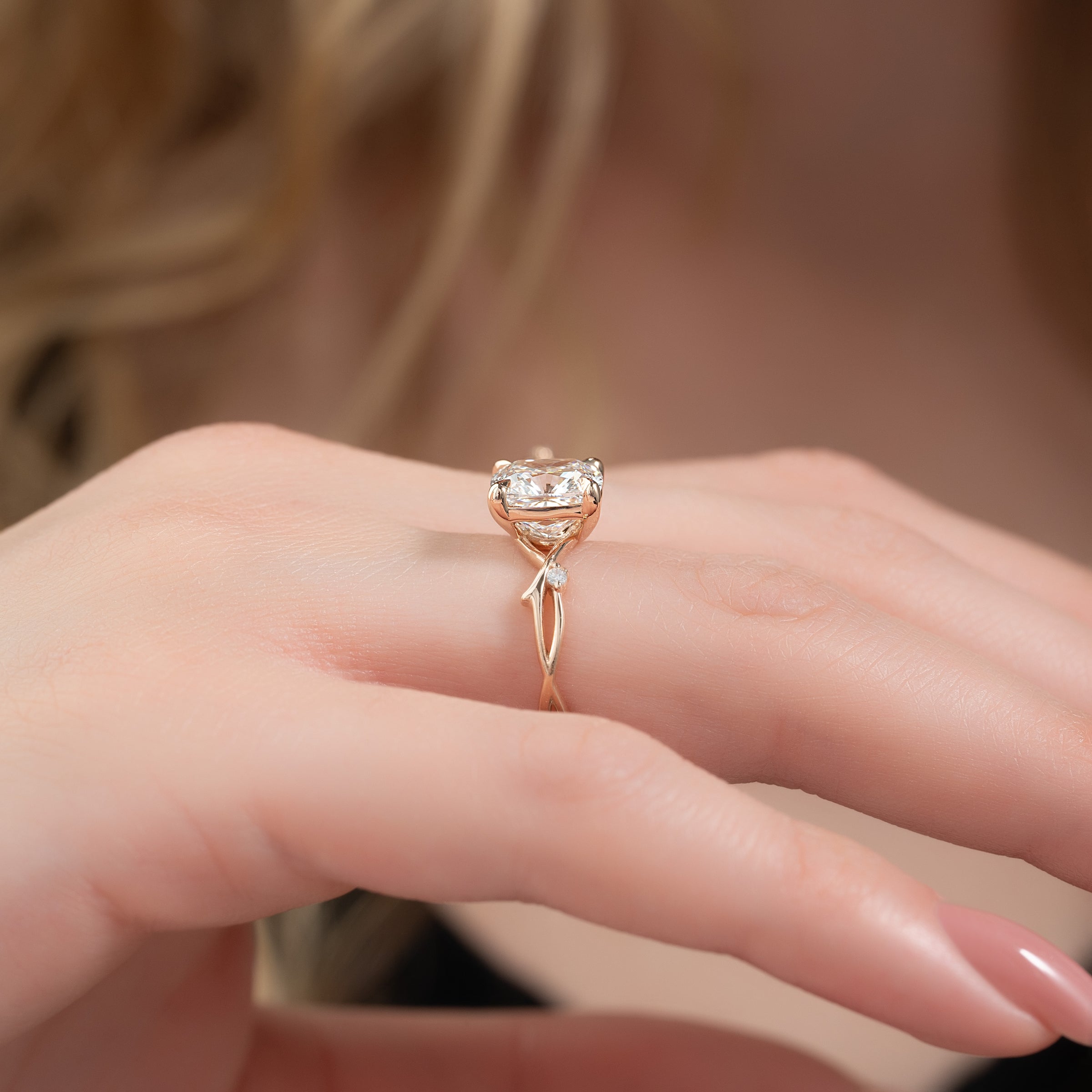 Lustrous Whim 1.50 Carat VVS1 Lab-Grown Cushion Three Stone Engagement Ring in 18K Rose Gold Closeup Side View