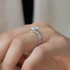 Lustrous Whim 1.50 Carat VVS1 Lab-Grown Cushion Three Stone Engagement Ring in 18K White Gold Finger Closeup View