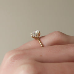 Luxe Blossom Cushion 1.55 Carat VVS1 Lab-Grown Hidden Halo Engagement Ring in 18K Yellow Gold Finger Closeup View