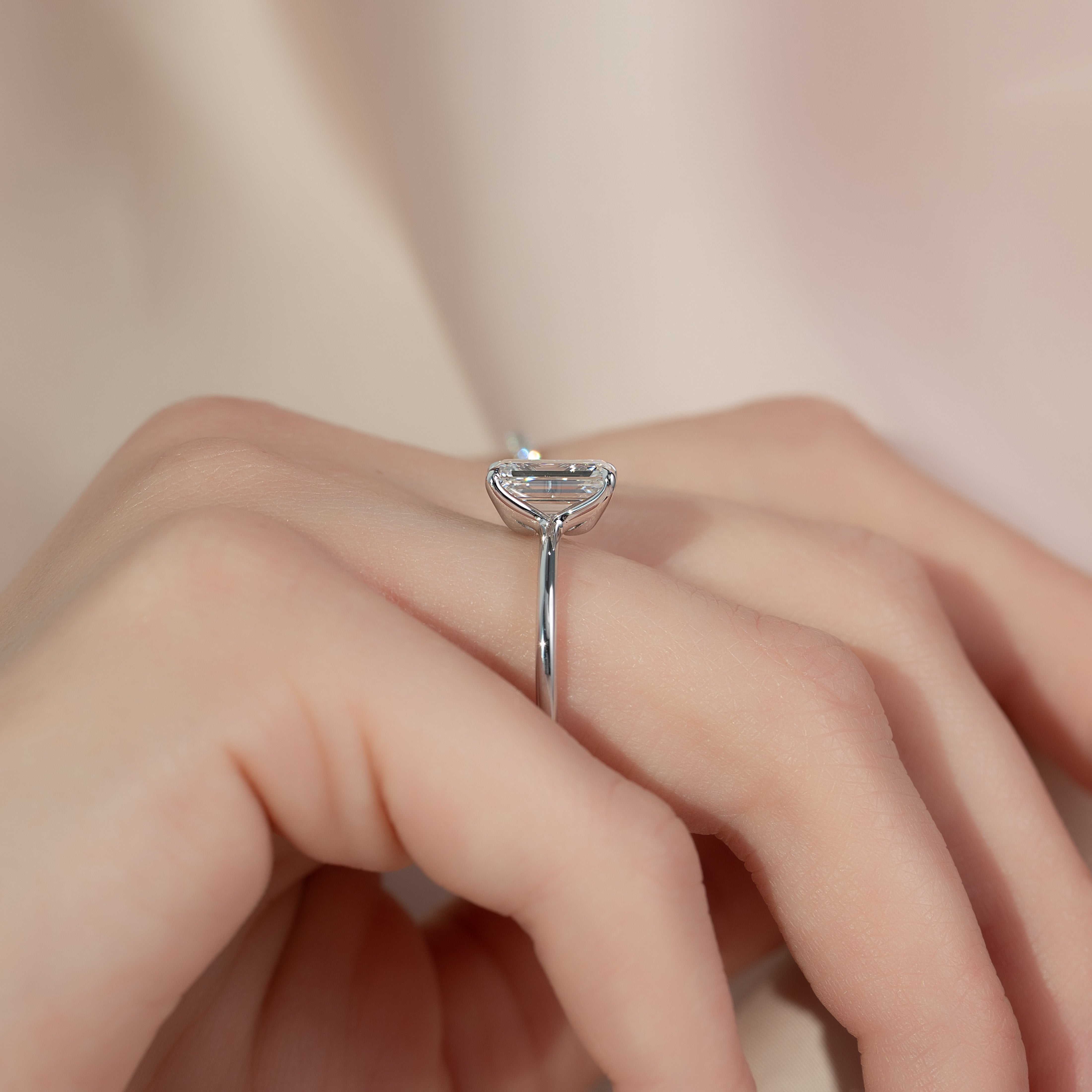 Majestic Empress 2.08 Carat VVS1 Lab‑Grown Emerald Solitaire Engagement Ring in 18K White Gold Finger Side View 1