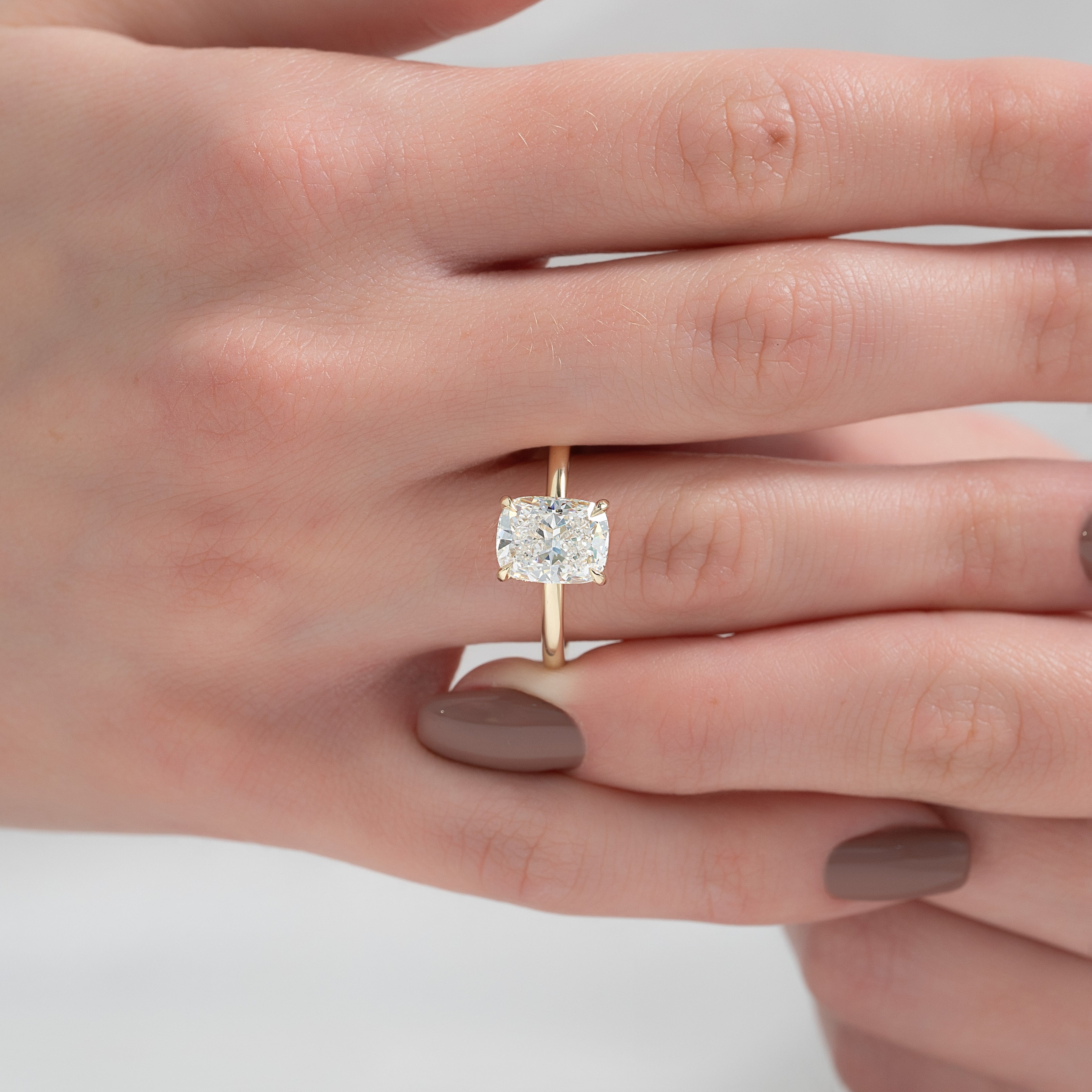 Mooncrest 3.05 Carat VVS Lab-Grown Elongated Cushion Hidden Halo Engagement Ring in 18K Yellow Gold Finger View