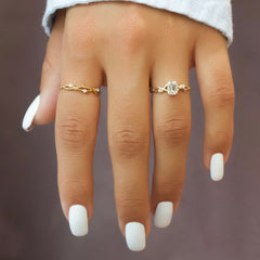 Noble Splendor 2 Carat VVS1 Lab-Grown Emerald Three Stone Engagement Ring in 18K yellow Gold Finger View