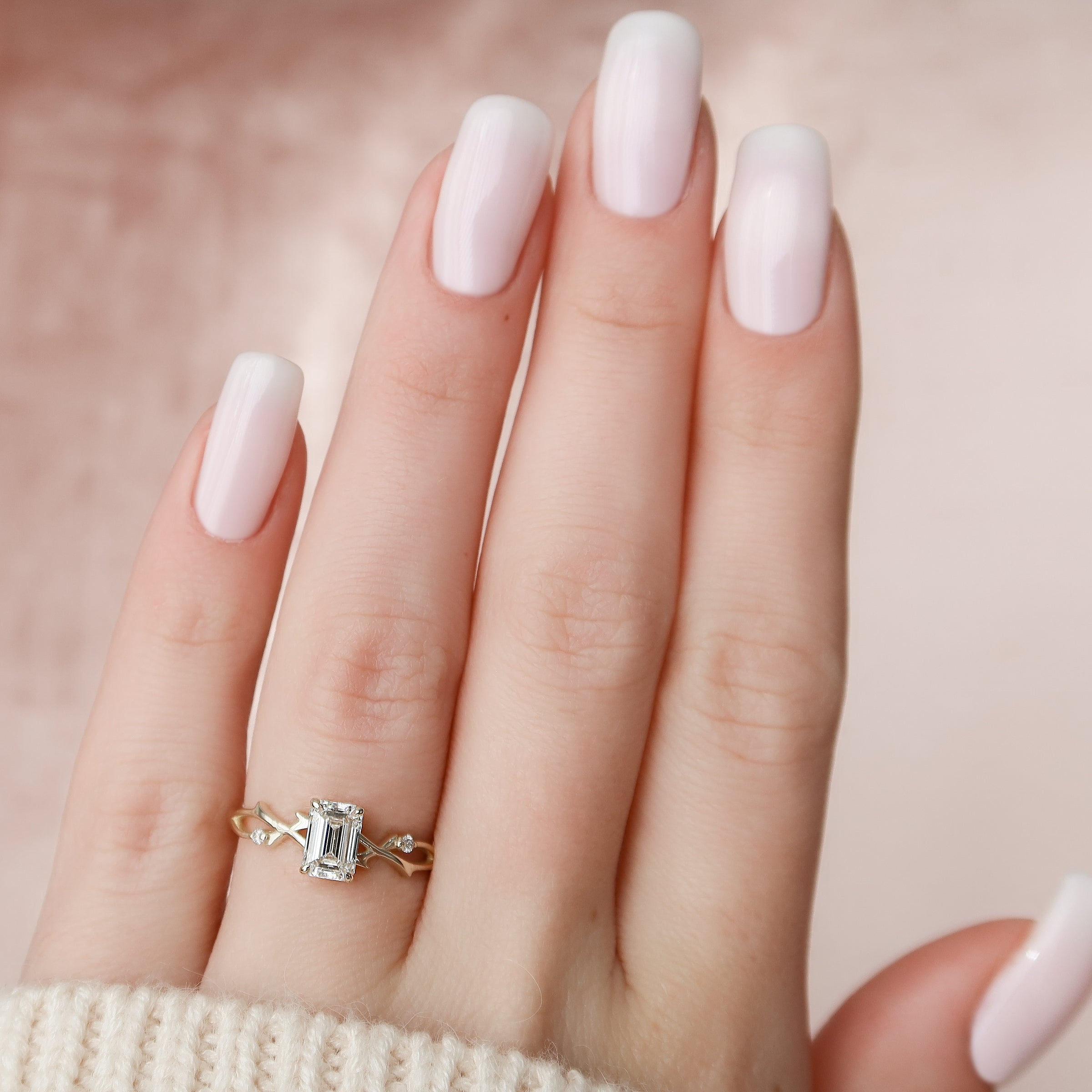 Noble Splendor 2 Carat VVS1 Lab-Grown Emerald Three Stone Engagement Ring in 18K yellow Gold Hand View