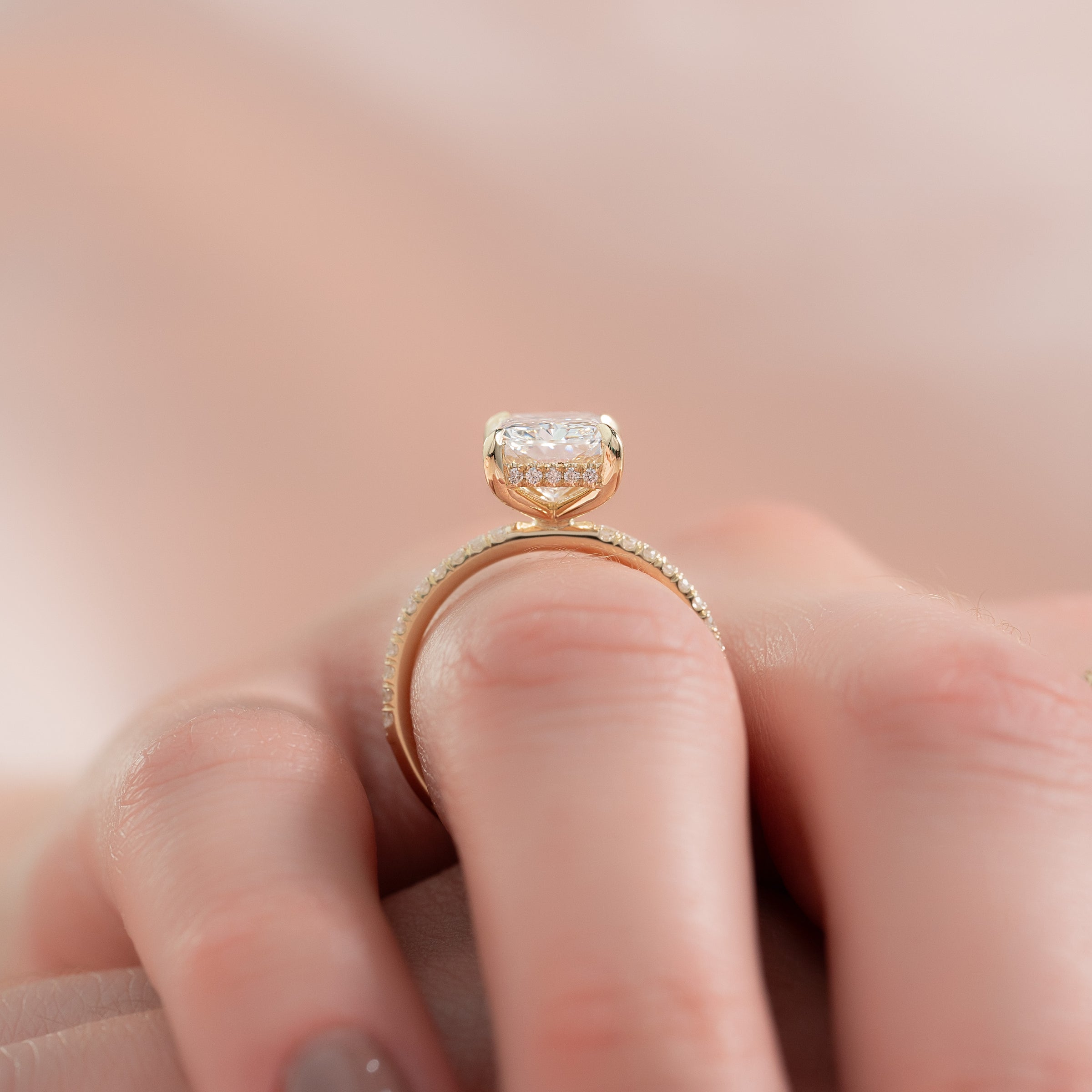 Nova Gleam 2.36 Carat VVS Lab-Grown Radiant Hidden Halo Pave Engagement Ring in 18K Yellow Gold Finger Closeup View