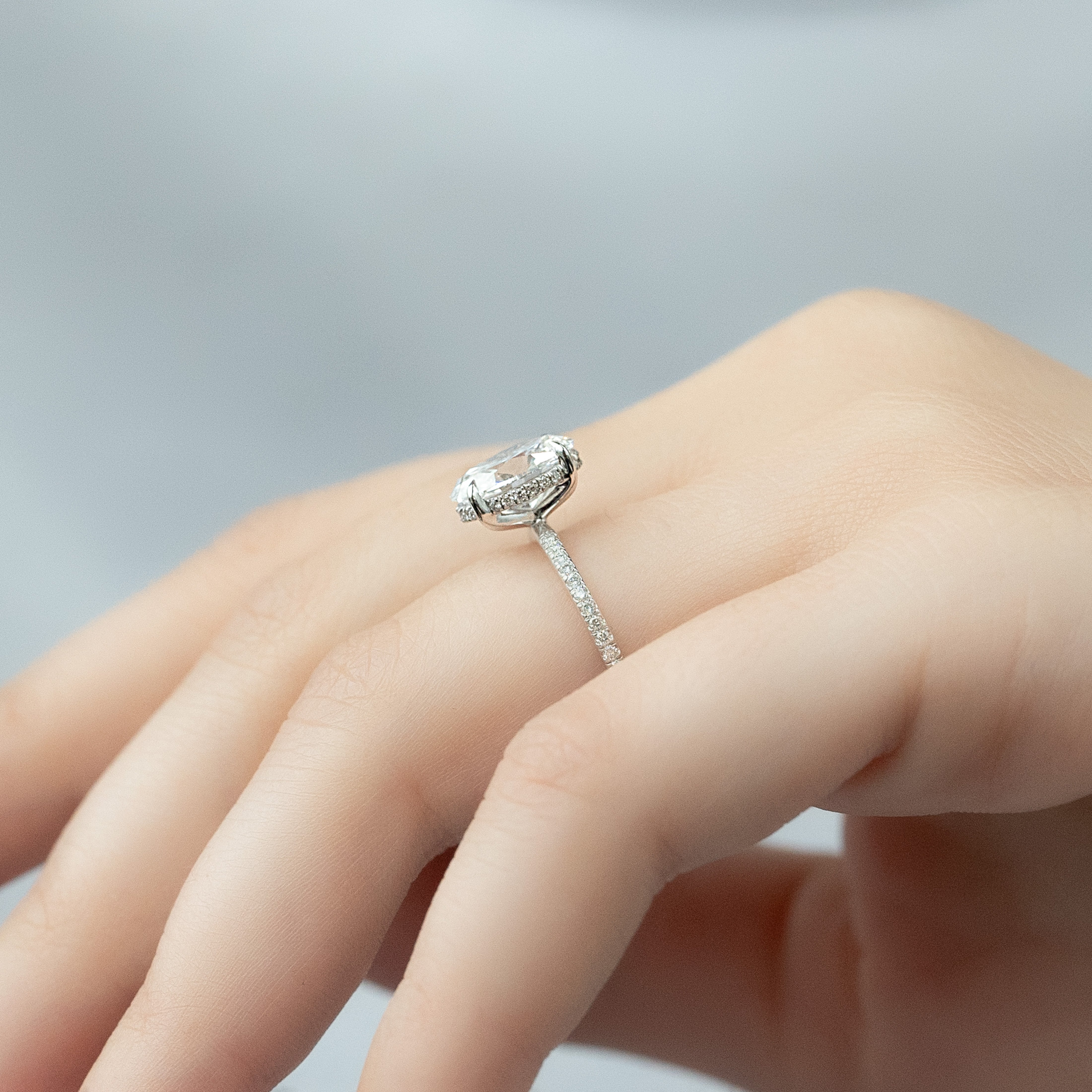 Opal Radiance 1.72 Carat VVS1 Lab-Grown Hidden Halo Pave Engagement Ring in 18K White Gold Finger Side View