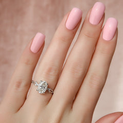 Opulent Serenity 2 Carat VVS1 Lab-Grown Oval Three Stone Ring in 18K White Gold Hand View