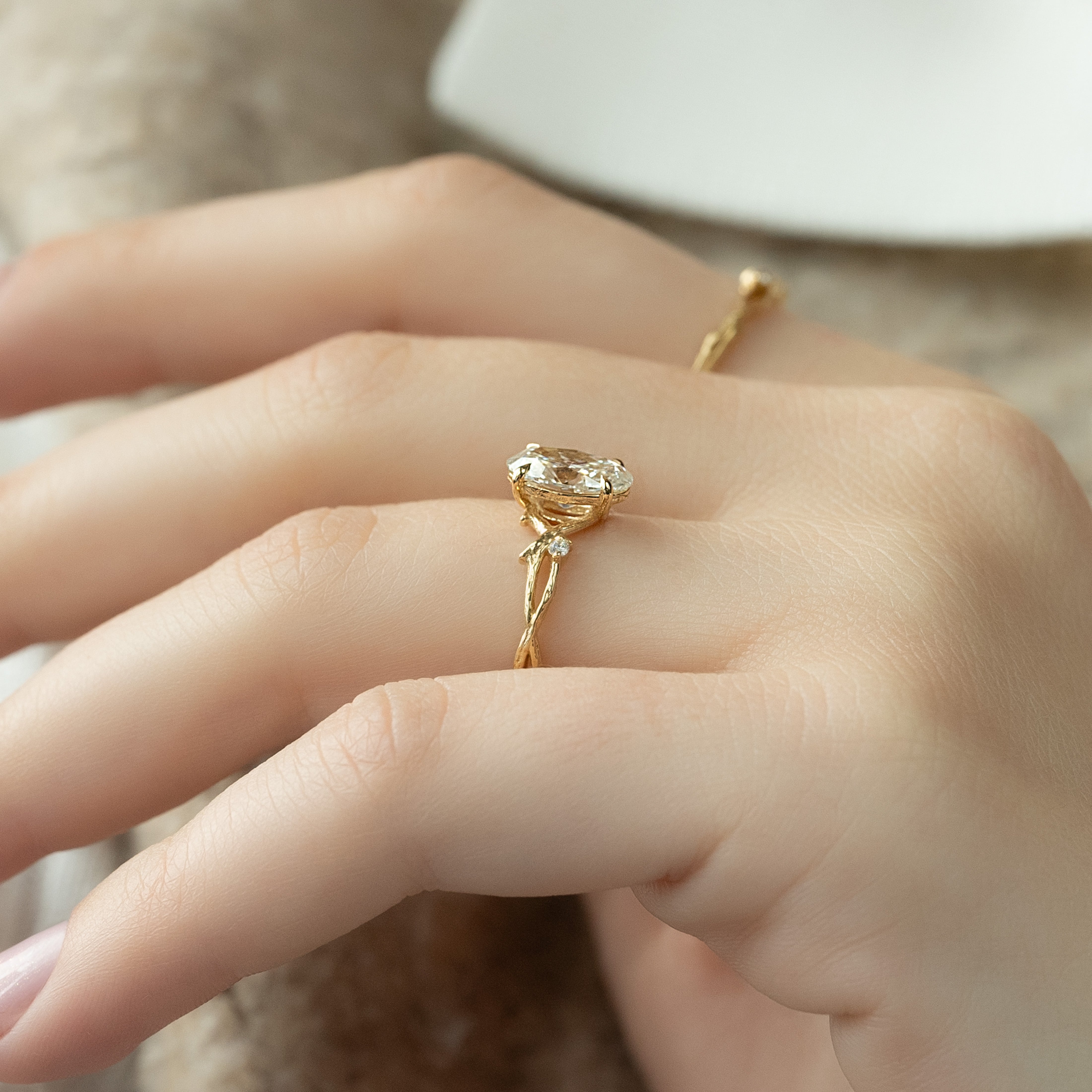 Opulent Serenity 2 Carat VVS1 Lab-Grown Oval Three Stone Ring in 18K Yellow Gold Side View