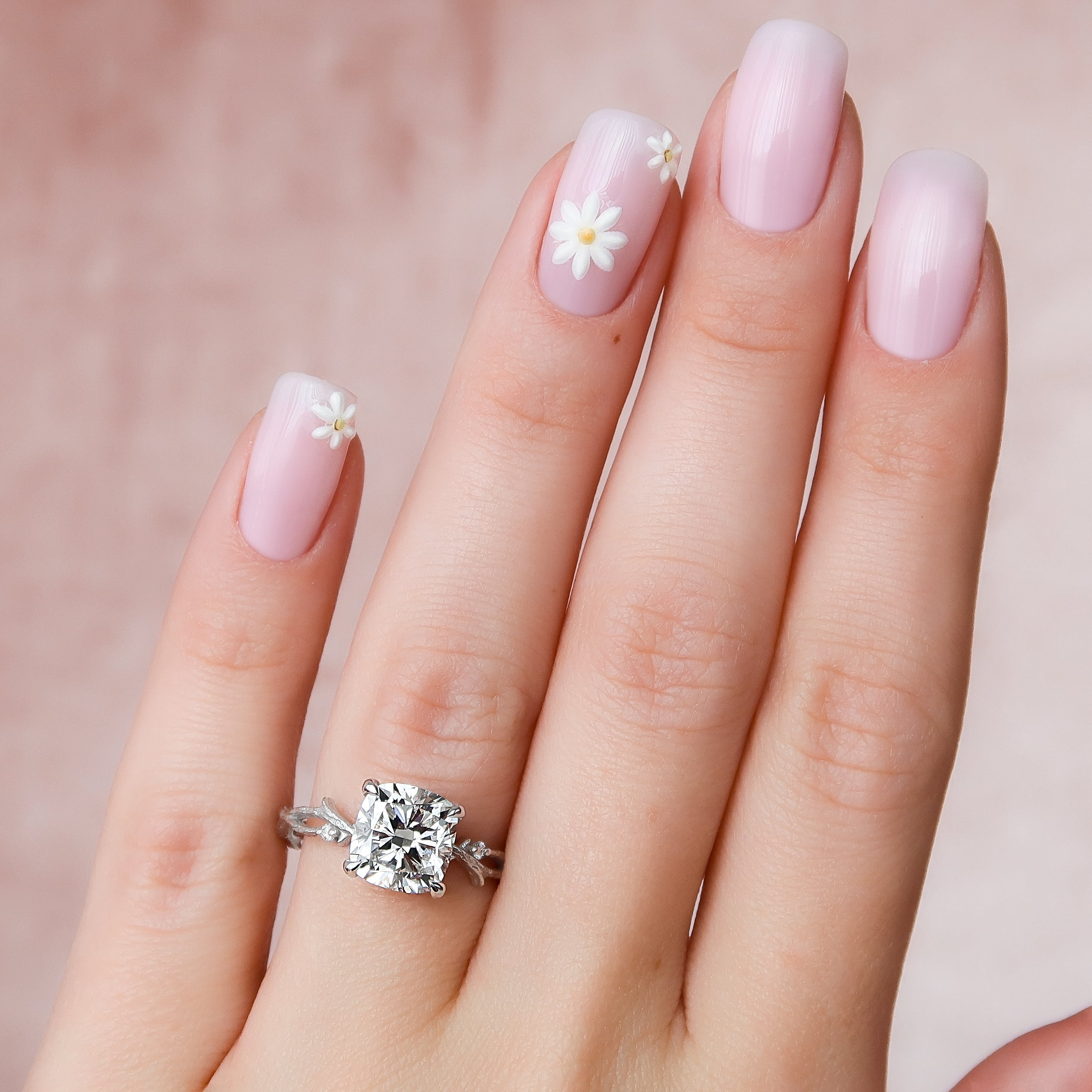 Prismatic Whisper 1.05 Carat VVS1 Lab‑Grown Cushion Textured Three Stone Ring in 18K White Gold Finger 
Closeup View