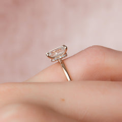 Regal Prism Emerald 2.52 Carat VVS1 Lab-Grown Hidden Halo Engagement Ring in 18K Rose Gold Finger Closeup View