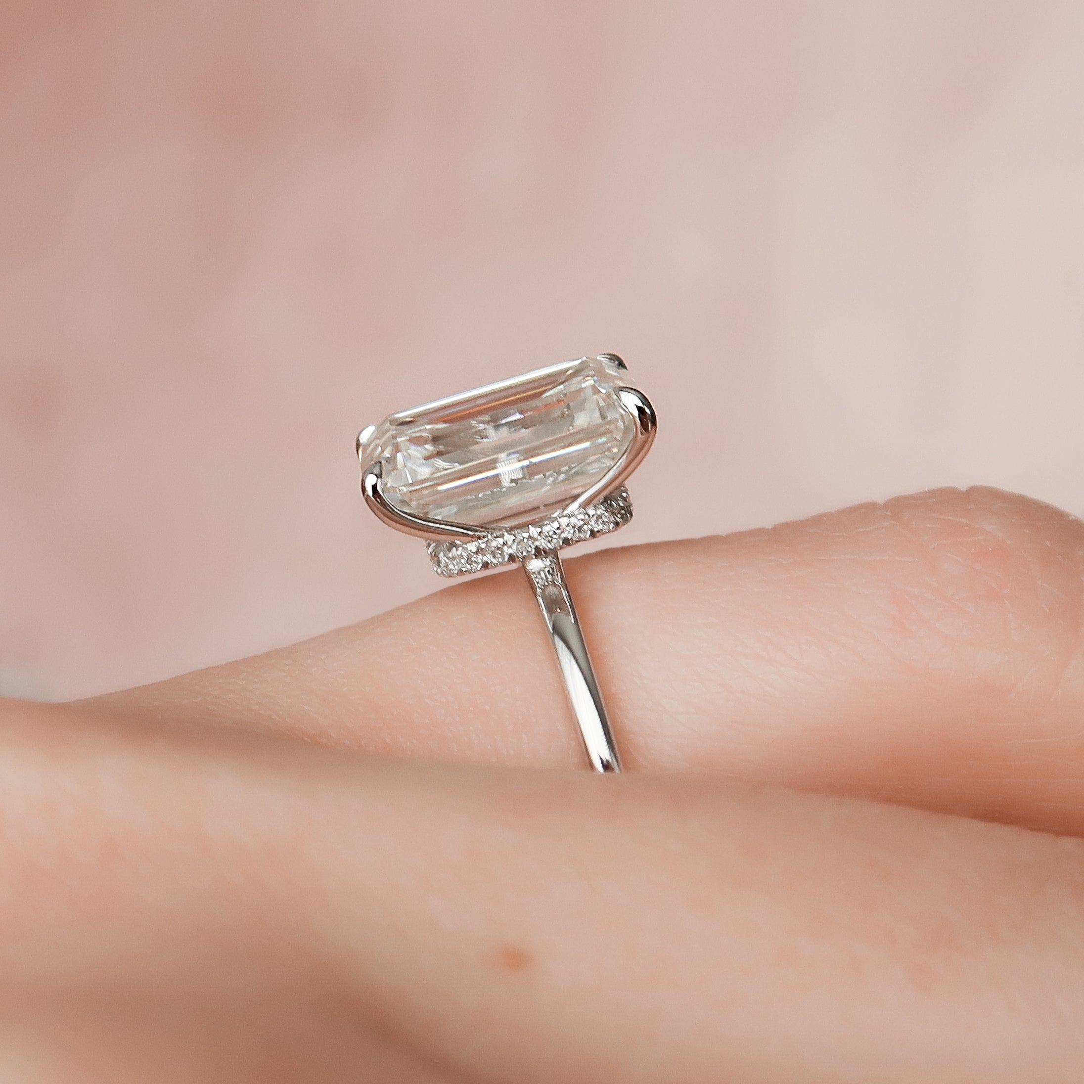 Regal Prism Emerald 2.52 Carat VVS1 Lab-Grown Hidden Halo Engagement Ring in 18K White Gold Finger Closeup View