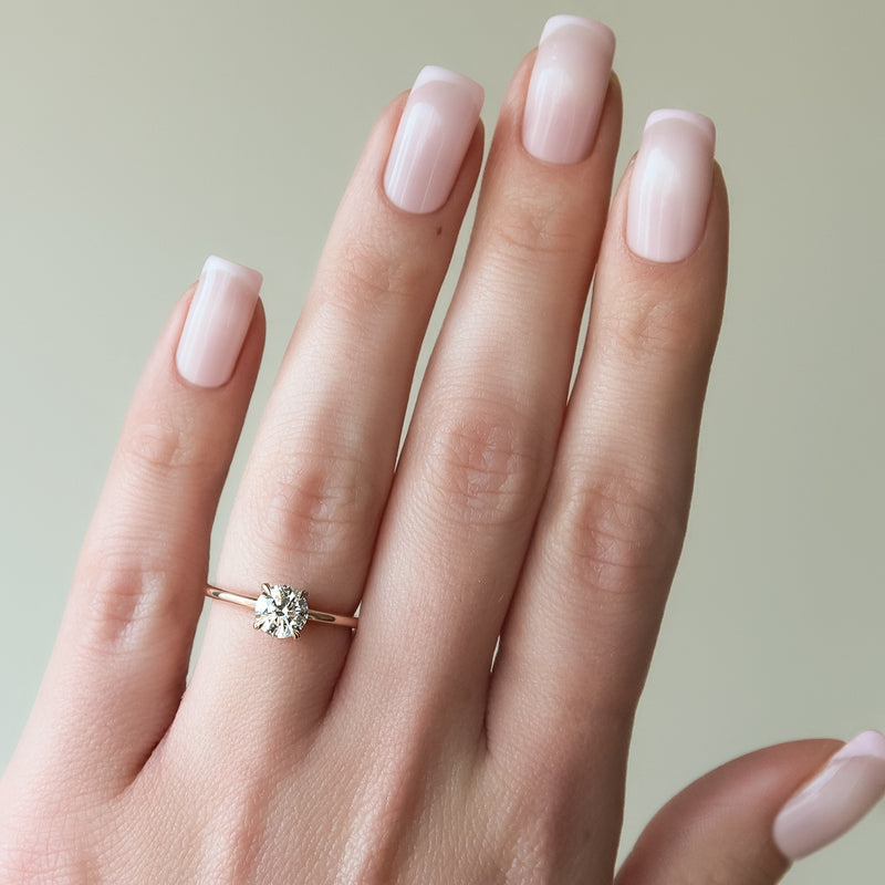 Seraphine Glow 2 Carat VVS1 Lab-Grown Solitaire Engagement Ring in 18K Yellow Gold Hand View 