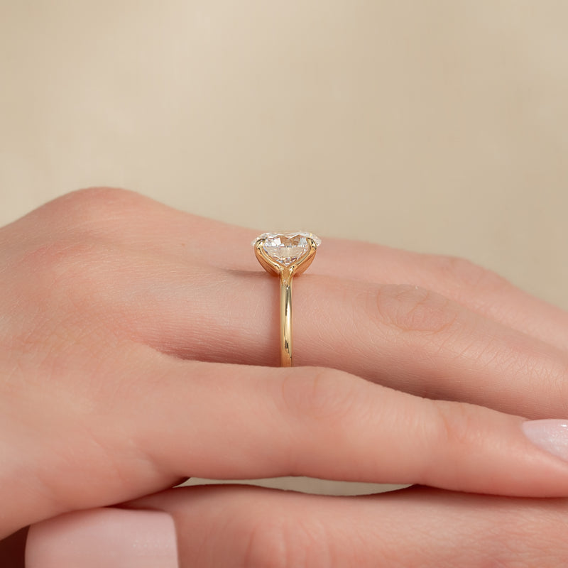 Seraphine Glow 2 Carat VVS1 Lab-Grown Solitaire Engagement Ring in 18K Yellow Gold Side Hand View 4
