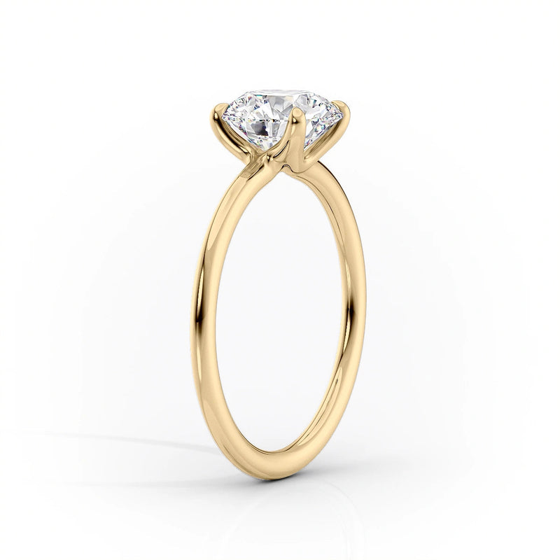 Seraphine Glow 2 Carat VVS1 Lab-Grown Solitaire Engagement Ring in 18K Yellow Gold Stand View 