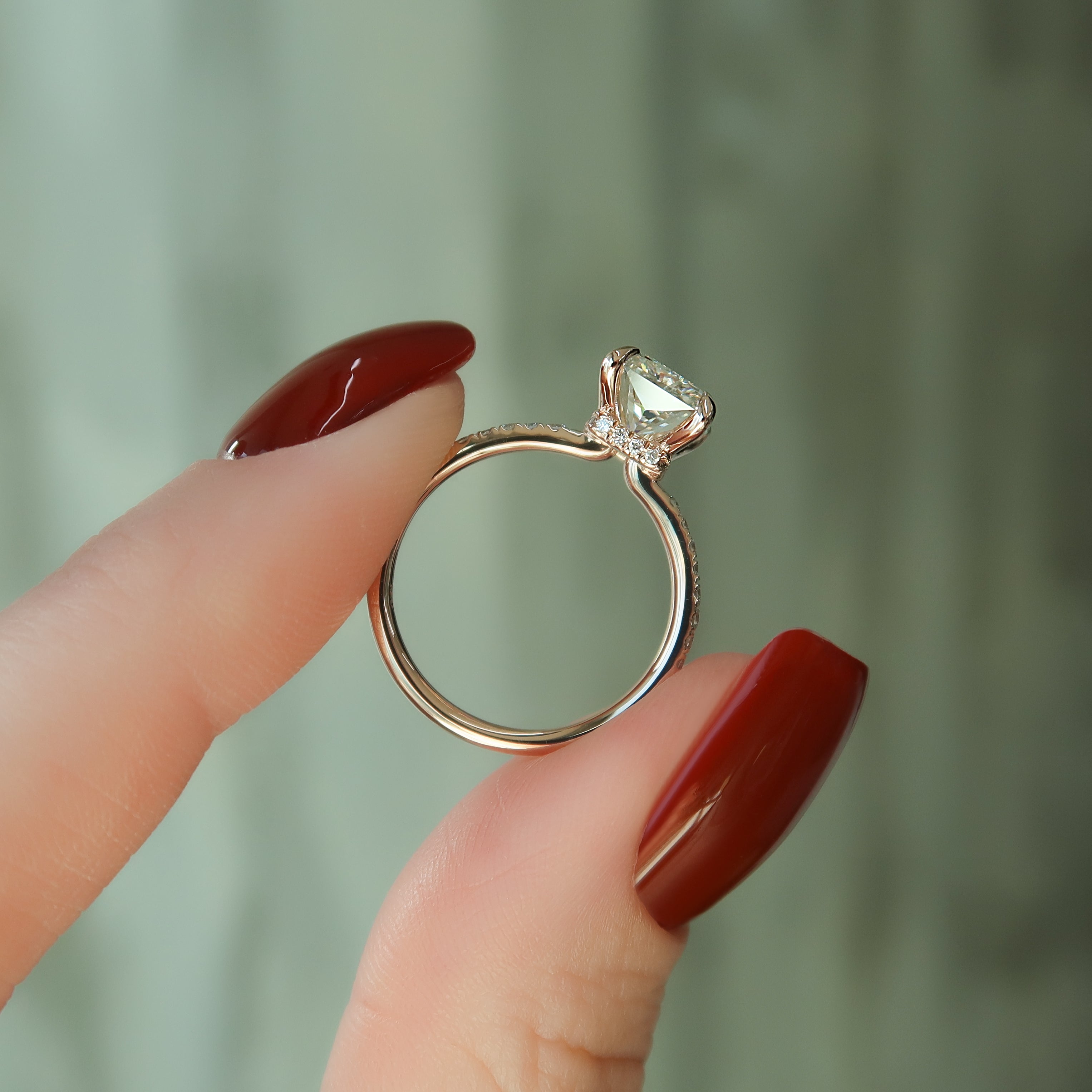 Stellar Prism 2.10 Carat VVS1 Lab-Grown Radiant Hidden Halo Pave Engagement Ring in 18K Rose Gold Hand View