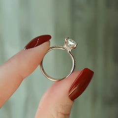 Stellar Prism 2.10 Carat VVS1 Lab-Grown Radiant Hidden Halo Pave Engagement Ring in 18K Rose Gold Hand View