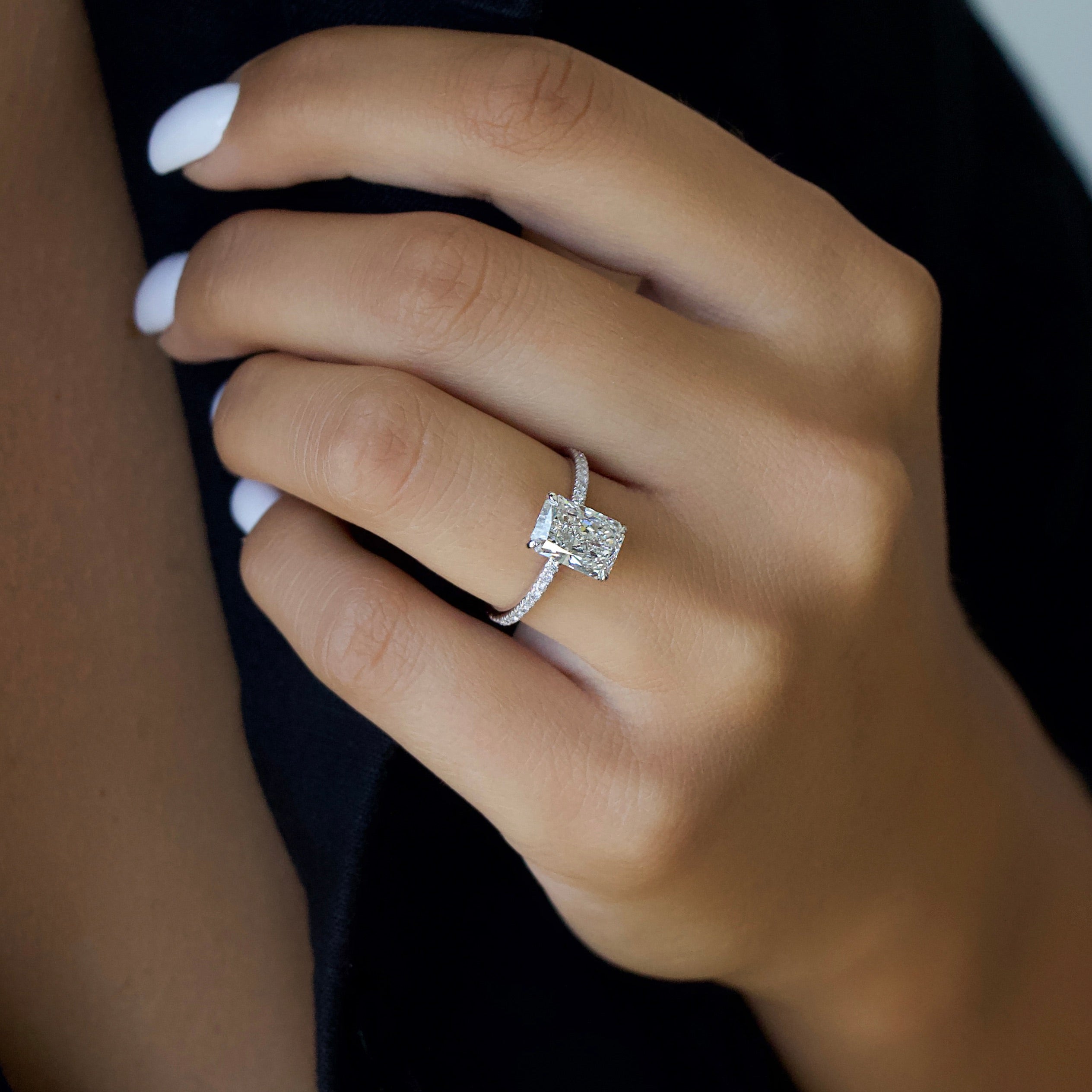 Stellar Prism 2.10 Carat VVS1 Lab-Grown Radiant Hidden Halo Pave Engagement Ring in 18K White Gold Finger View