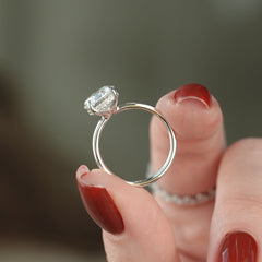Stellar Round 2.50 Carat VVS1 Lab‑Grown Hidden Halo Engagement Ring in 18K White Gold Hand View