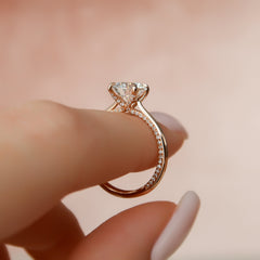 Stellar Whisper 2 Carat VVS1 Lab-Grown Round Solitaire With Accents Engagement Ring in 18K Rose Gold Finger Stand View