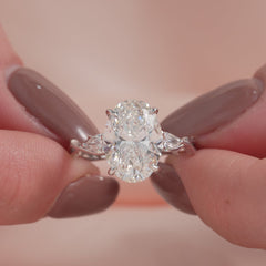 Timeless Elegance 1.58 Carat VVS1 Lab-Grown Oval Three Stone Engagement Ring in 18K White Gold
 Closeup View