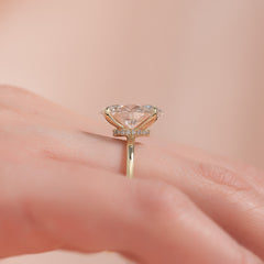 Timeless Oval 2.09 Carat VVS1 Lab-Grown Hidden Halo Engagement Ring in 18K Yellow Gold Finger Closeup View