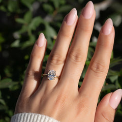 Timeless Oval 2.09 Carat VVS1 Lab-Grown Hidden Halo Engagement Ring in 18K Yellow Gold Finger View_1